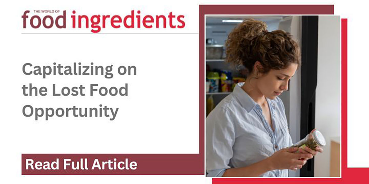 The World of Food Ingredients logo with a photo of a woman looking at a jar of food - cover for article "Capitalizing on the Lost Food Opportunity"